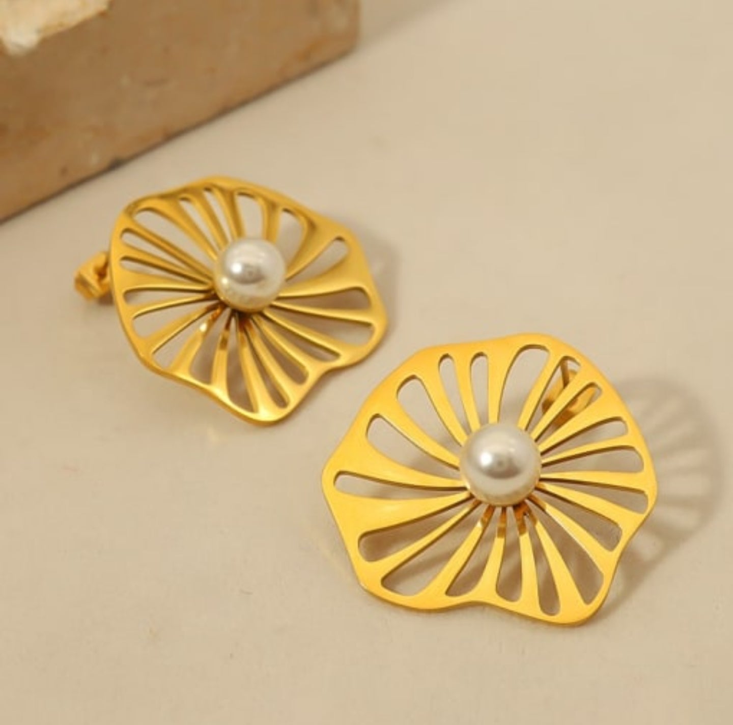 Pearl gold plated studs